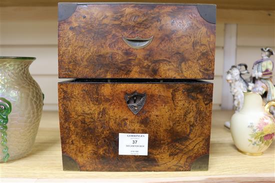 A burr walnut four bottled decanter box